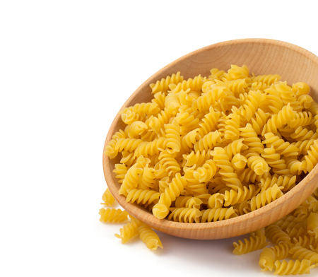 pasta fusilli isolated on white backgroundの写真素材