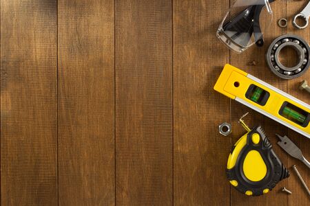 work tools and instruments on wooden background