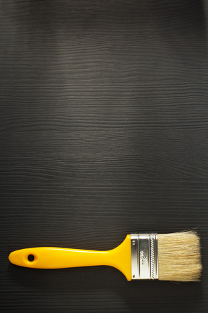 paint brush on wooden backgroundの写真素材