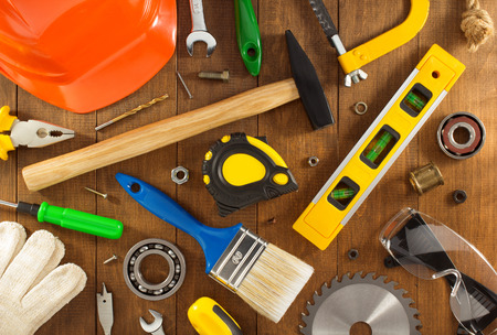 work tools and instruments on wooden background