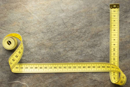 measuring tape on table backgroundの写真素材