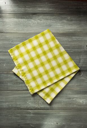 cloth napkin on wooden table backgroundの写真素材