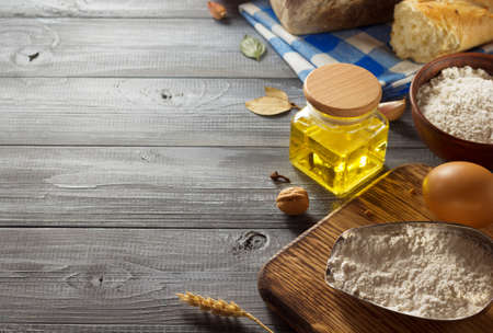 bread and bakery products on wood background