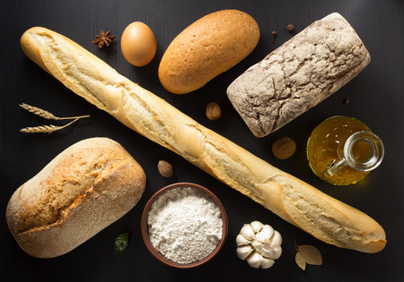 bread and bakery products on wooden background