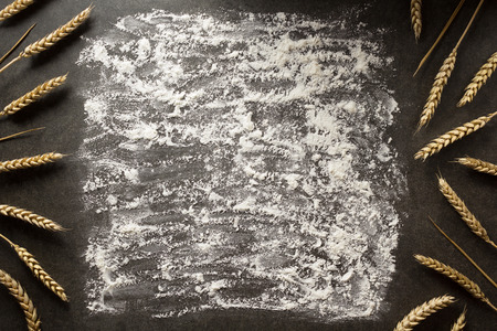 ears of wheat on  black background textureの写真素材