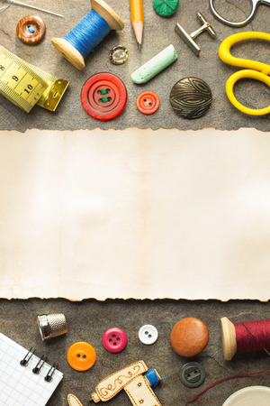 sewing tools and accessories on table backgroundの写真素材