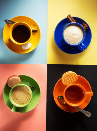 cup of coffee, tea and cacao at colorful backgroundの写真素材