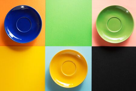 empty saucer at abstract colorful backgroundの写真素材