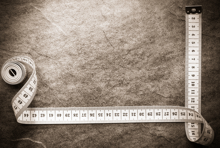 measuring tape on table backgroundの写真素材