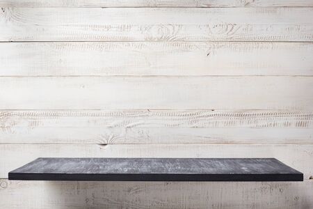 shelf at white plank wooden background texture