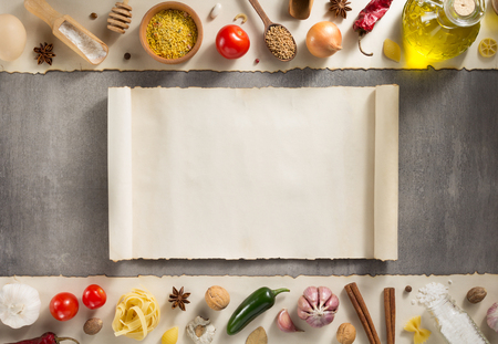 spice and herbs ingredients at stone backgroundの写真素材