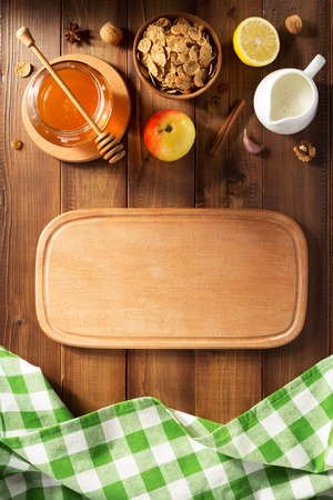 glass jar of honey on wooden backgroundの写真素材