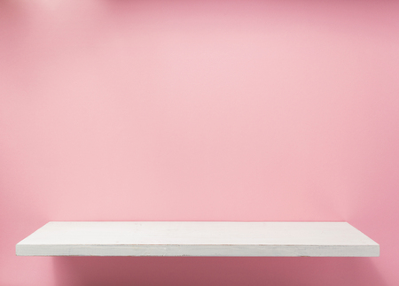 woden shelf at abstract wall background surfaceの写真素材