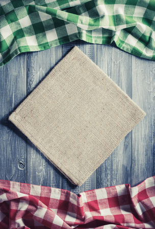 cloth checked napkin on wooden backgroundの写真素材
