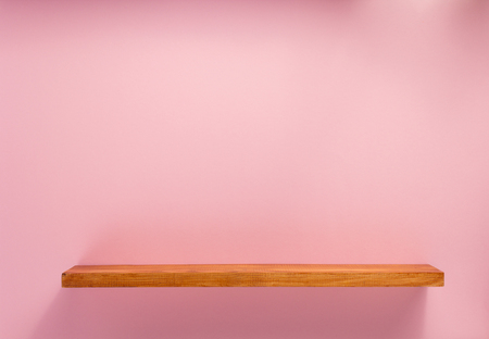 woden shelf at abstract wall background surfaceの写真素材