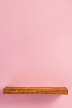 woden shelf at abstract wall background surfaceの写真素材