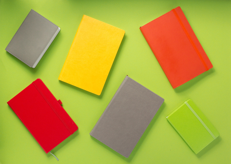notebook at abstract background surface