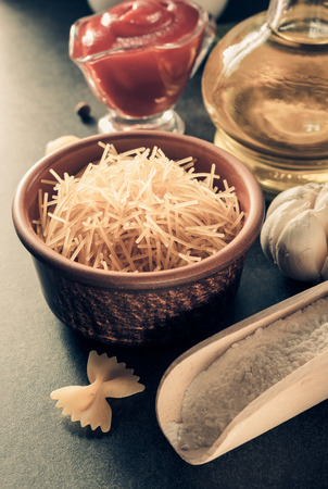 pasta and food ingredient  on dark backgroundの写真素材