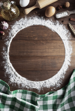 flour powder on wooden backgroundの写真素材