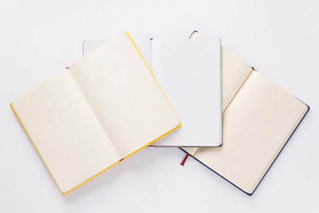 open notebook with empty pages on white  background, top viewの写真素材