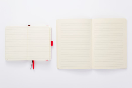 paper notebook or note pad book at white backgroundの写真素材