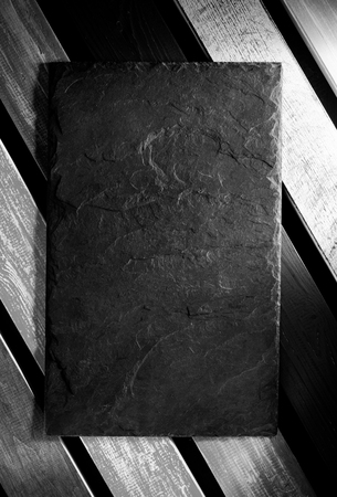 Slate signboard at black  textureの写真素材