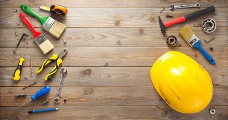 set of tools and instruments at wooden surface backgroundの写真素材