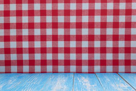 Rustic wooden table in front and cloth napkin, plank boardの写真素材