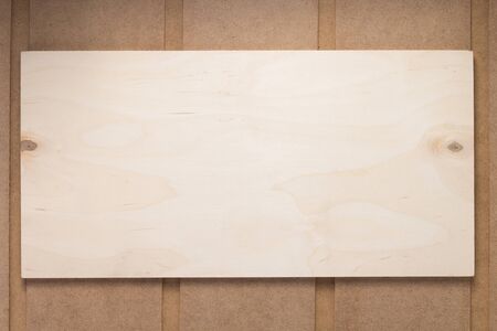 nameplate or wall sign at wooden mdf boards  background as texture surface