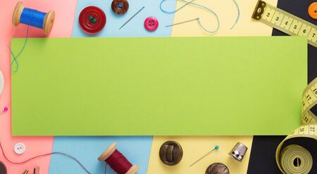 sewing tools and accessories at paper background texture, top viewの写真素材