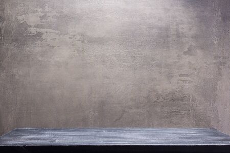 wooden shelf at cocncrete  wall background as surface texture