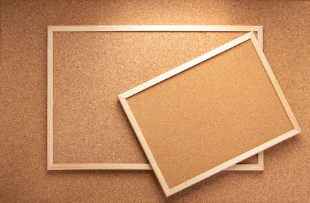 cork board in wooden frame as background textureの写真素材