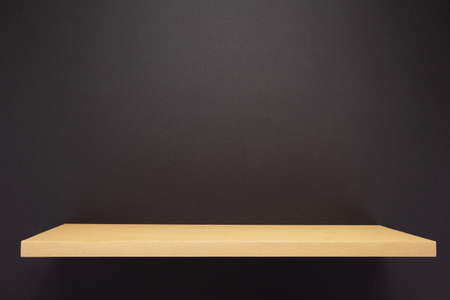 book shelf at abstract wall backgroundの写真素材