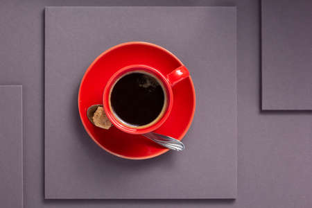 cup of coffee at grey background texture as minimalism conceptの写真素材