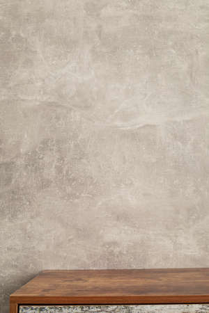 wooden table near grey wall background texture surface
