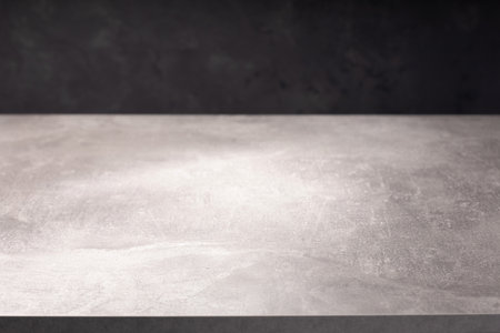 wooden table or tabletop near wall background, front low angle view