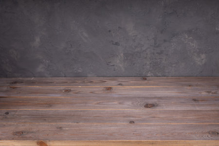 wooden plank board table and wall background, front low angle view of tabletop