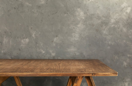 wooden table or tabletop near concrete wall background, place for work tools