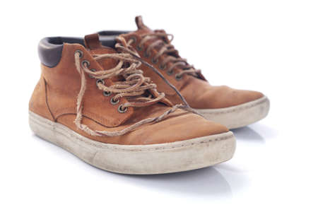 old suede leather travel vintage boots shoes isolated on white backgroundの写真素材