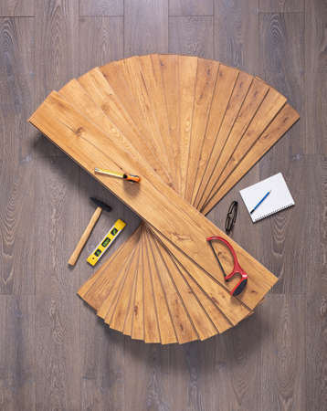 Laminate floor on wood texture and tools.の写真素材