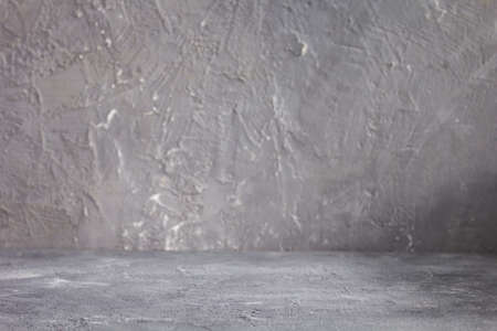 Empty concrete background texture surface in front. Plaster  background wall texture. Grey or gray stone backgroundの写真素材