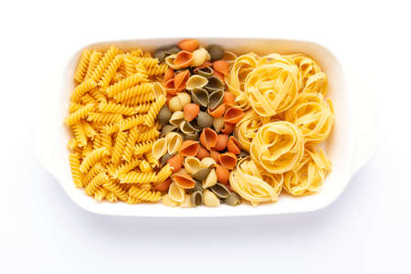 Pasta collection food in plate isolated on white background. Raw pasta italian food at white