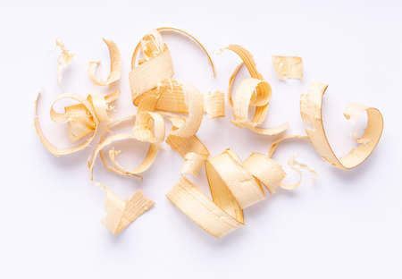 Wooden shavings on white background. Wood shaving at white