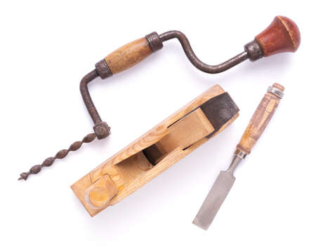 Carpenter chisel and plae tool isolated on white background. Woodworking joiner toolの写真素材