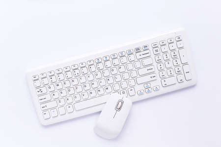 Computer keyboard and mouse on white backgroundの写真素材