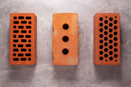 Construction brick at cement background. Brick and wall texture or floorの写真素材