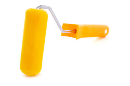 Paint roller isolated at white background. Construction tool for house room renovation