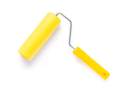 Paint roller isolated at white background. Construction tool for house room renovationの写真素材