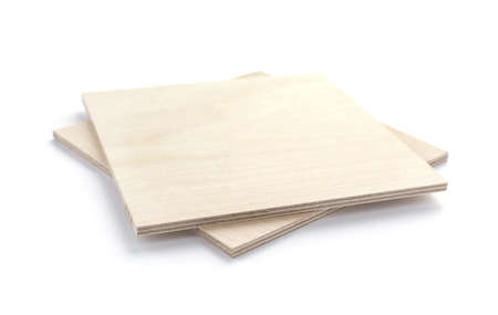Plywood boards isolated on white background. Stack of plywood pieces on white