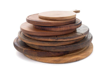 Wood cutting board isolated on white background. Wooden pizza boardの写真素材